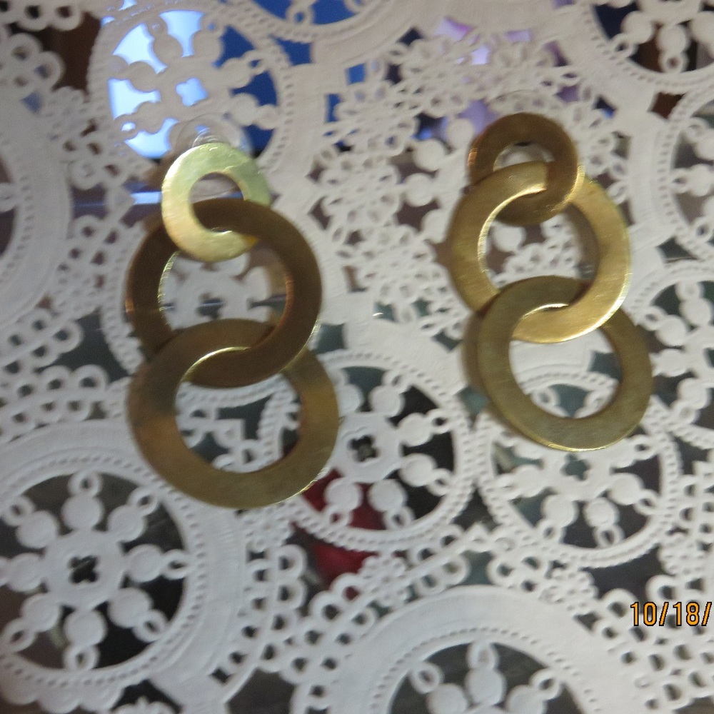 Costume jewelry post gold metal pierced earrings